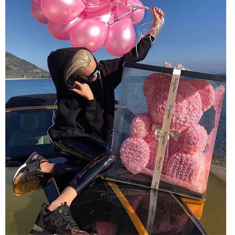 Urso de pelúcia flor rosa